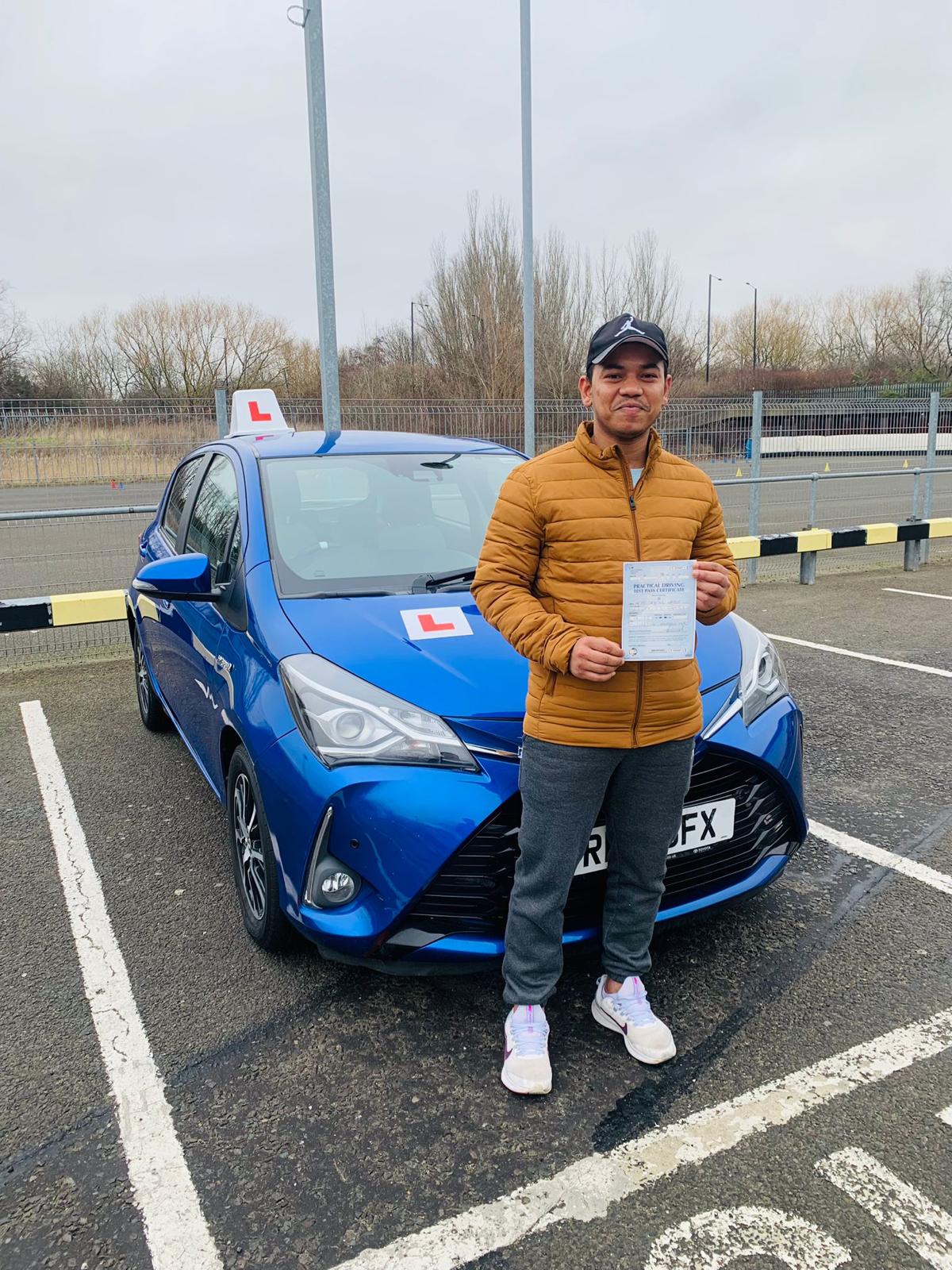 Happy student T.J. who passed driving test in London
